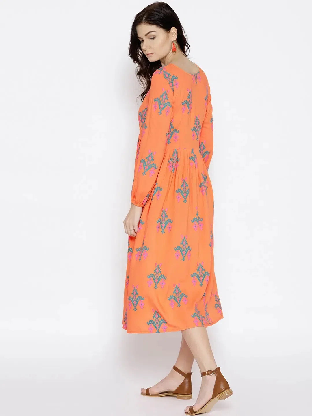 Trendy Urban Attire Midi dress with ikat print and balloon sleeve in Peach