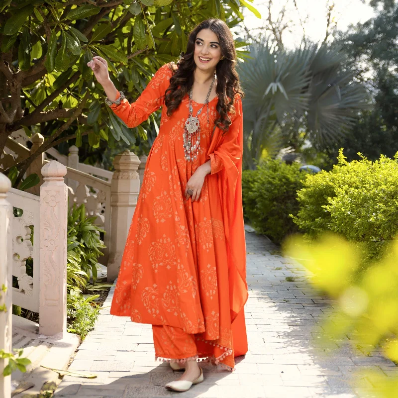 Trendy Women's Wear Orange Flared Kurta Dupatta Pant Set with Pompom Details